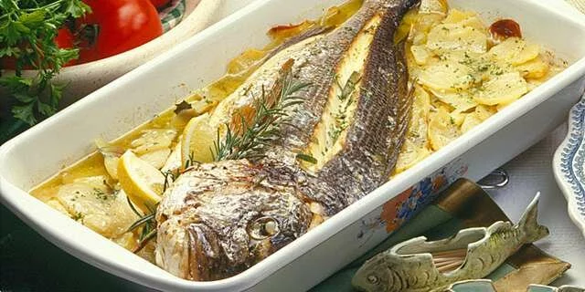 Roasted gilthead sea bream in wine