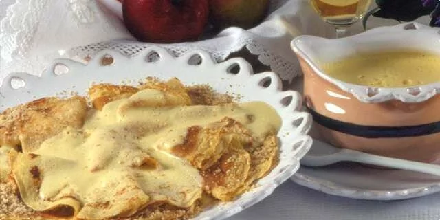 Pancakes with walnuts and wine topping