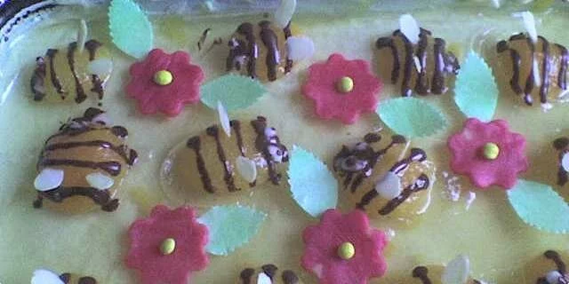 A bee cake or bees among flowers