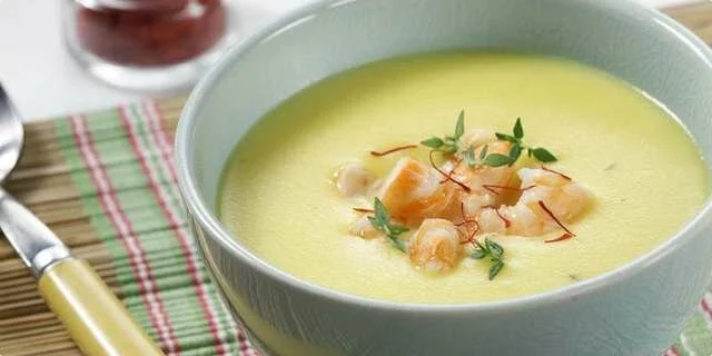 Potato soup with saffron and shrimp