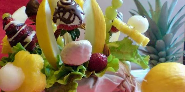 A basket with a fruit bouquet